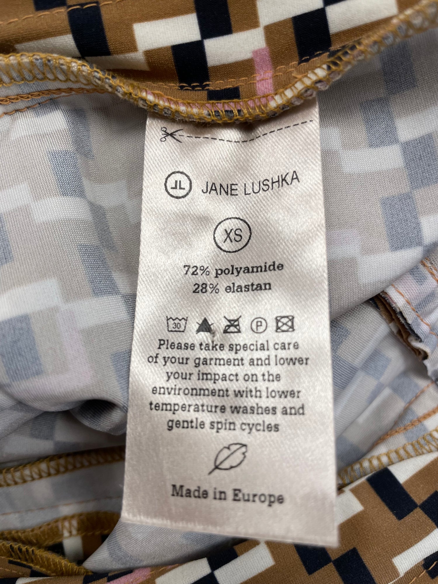 Jane Lushka broek travelstof maat XS 34 bruin zwart wit