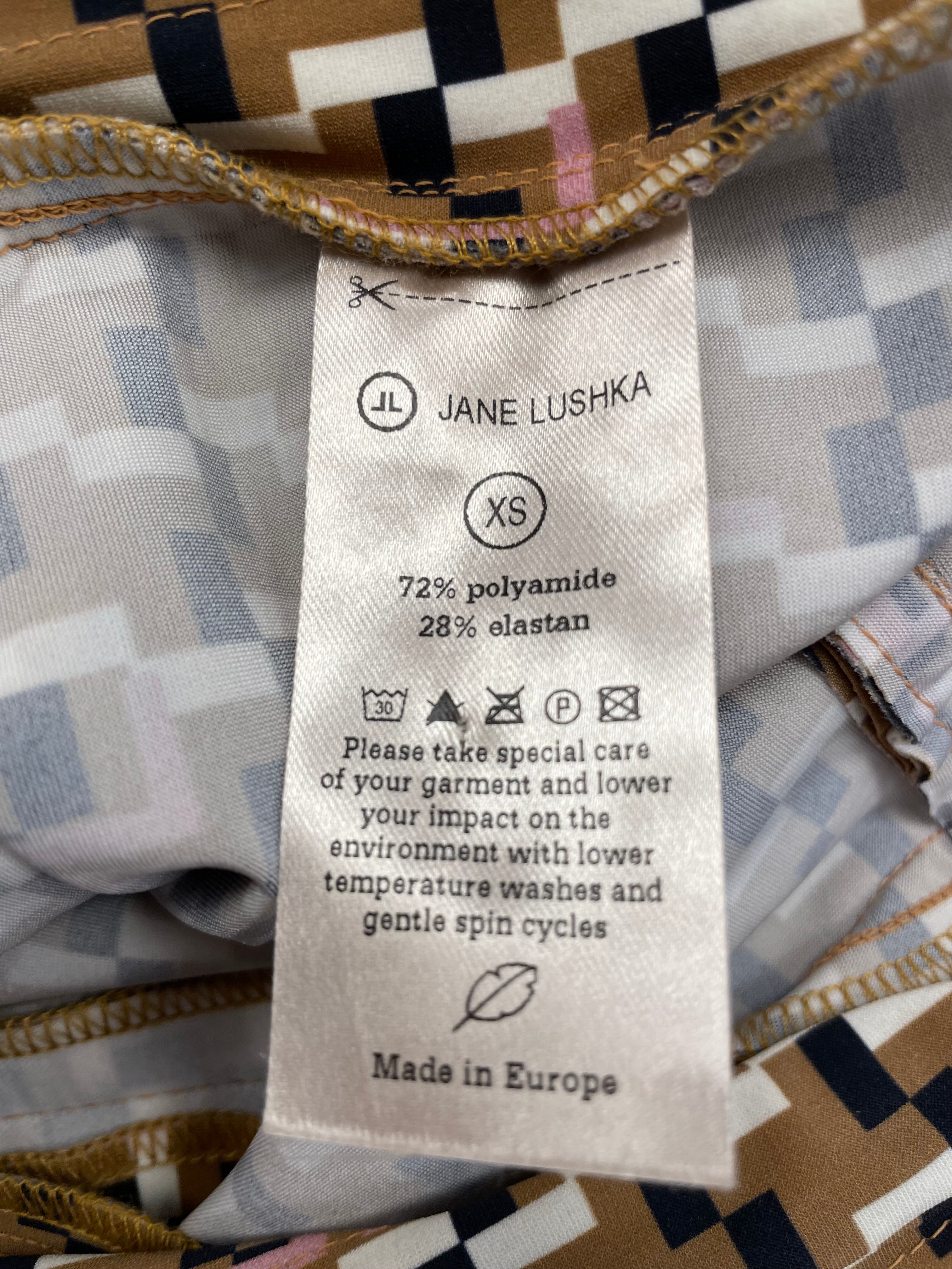 Jane Lushka broek travelstof maat XS 34 bruin zwart wit